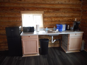 Fridge, microwave, coffee/tea maker, dining tables