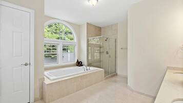Shower, jetted tub, hair dryer, towels