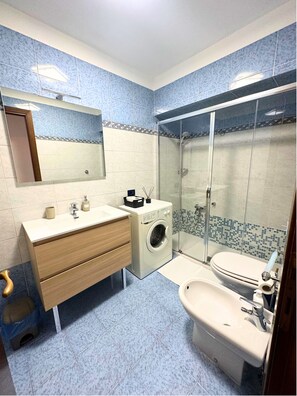 Hair dryer, towels, soap, toilet paper