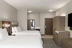 Premium bedding, pillowtop beds, desk, laptop workspace
