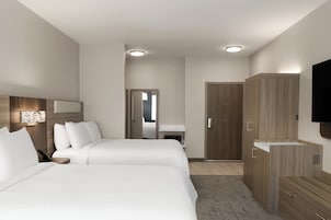 Premium bedding, pillowtop beds, desk, laptop workspace