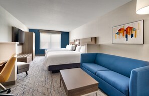 Premium bedding, pillow-top beds, desk, laptop workspace
