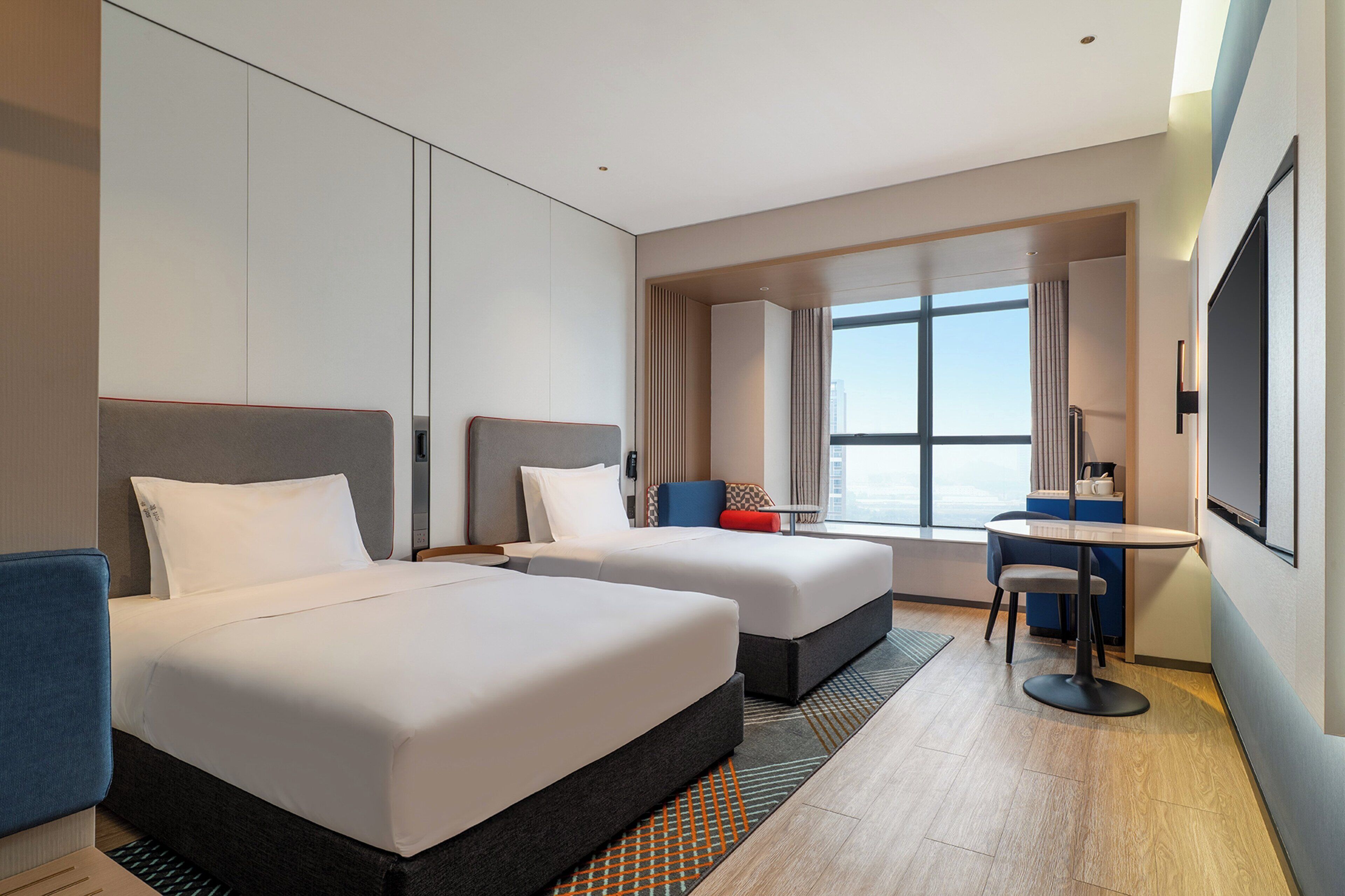 Premium bedding, down comforters, desk, laptop workspace