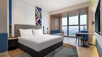 Premium bedding, down duvets, desk, laptop workspace