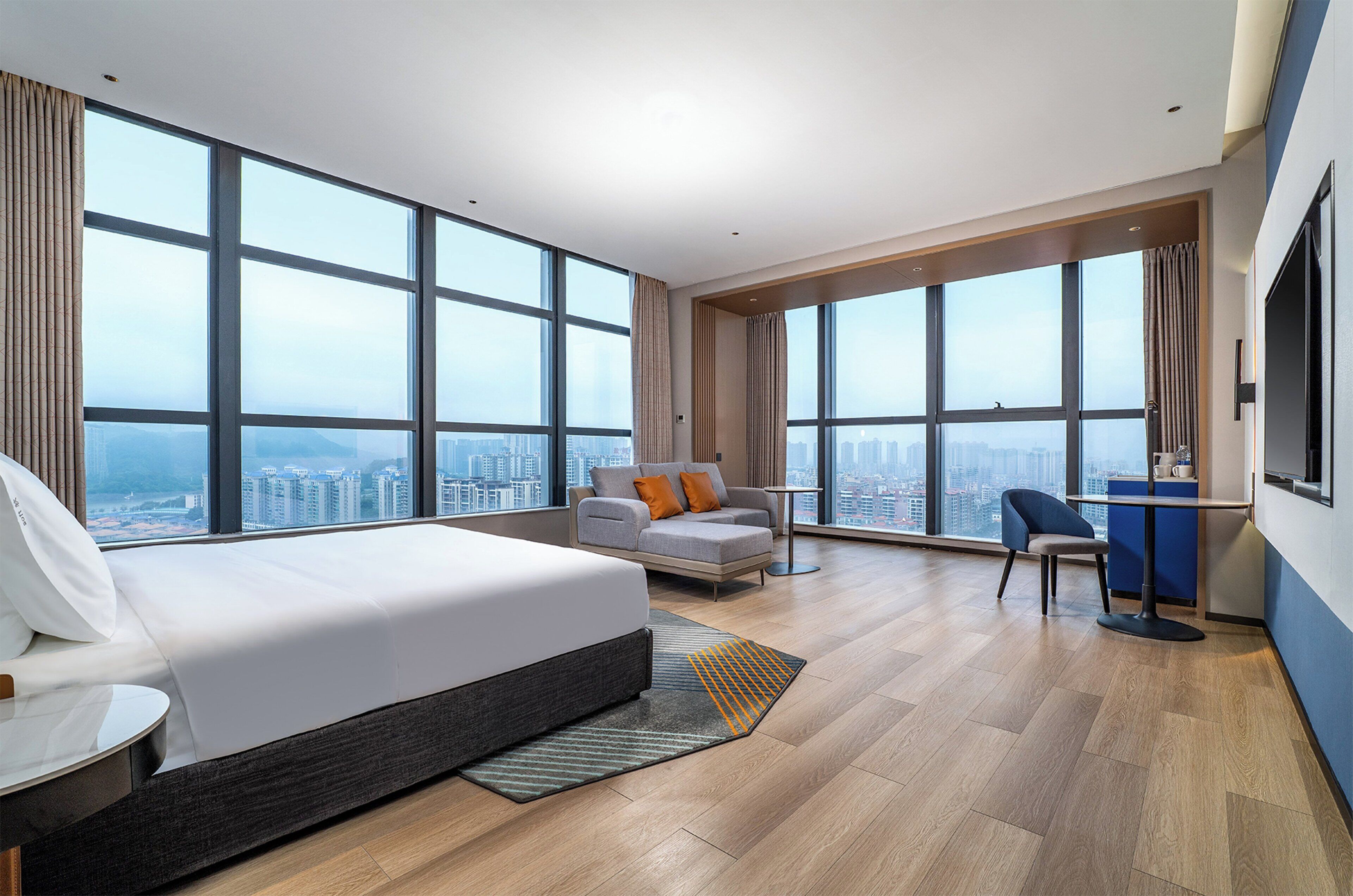 Premium bedding, down comforters, desk, laptop workspace