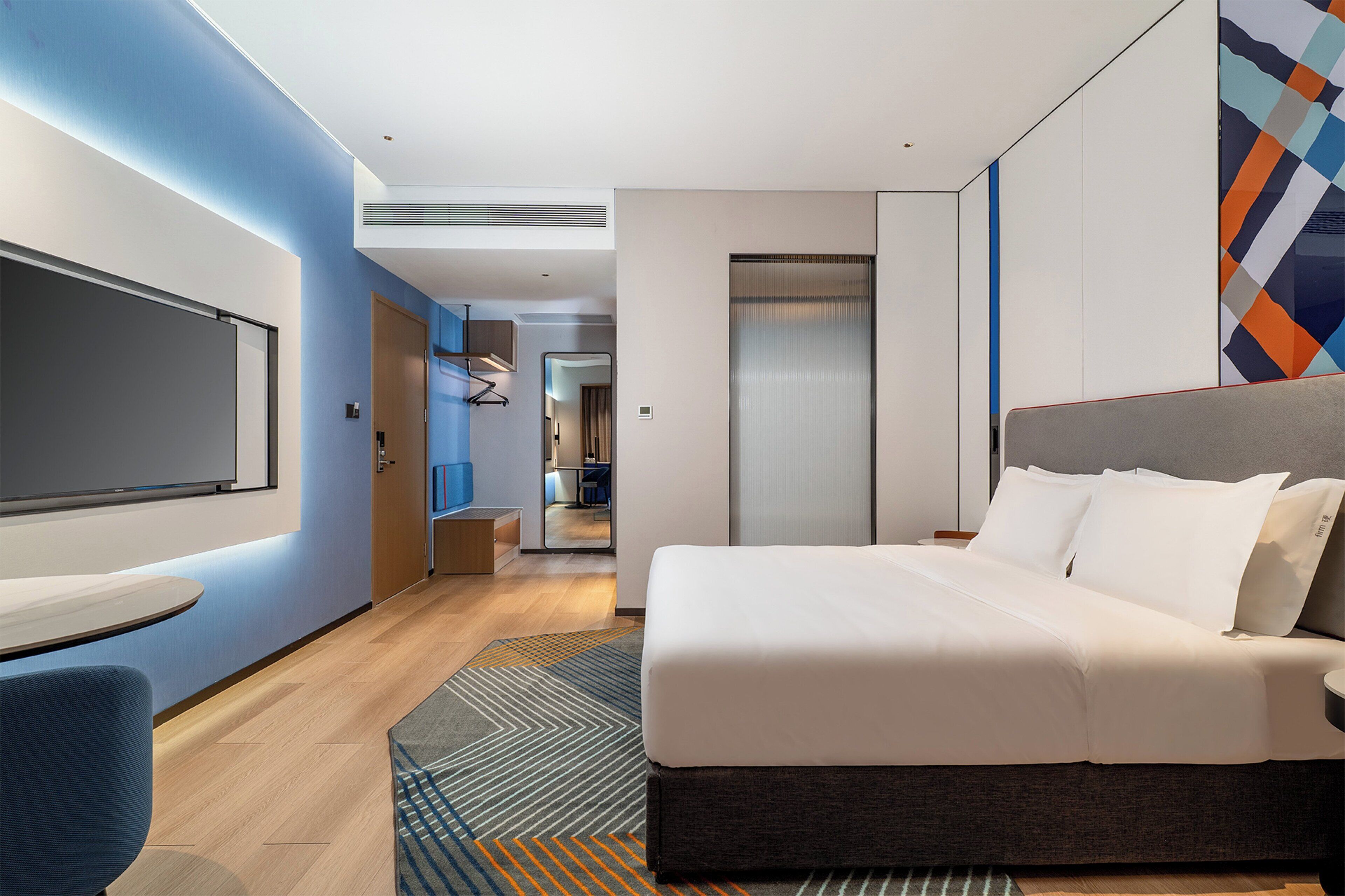 Premium bedding, down comforters, desk, laptop workspace