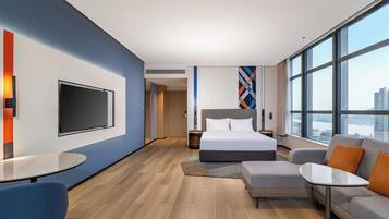 Premium bedding, down comforters, desk, laptop workspace