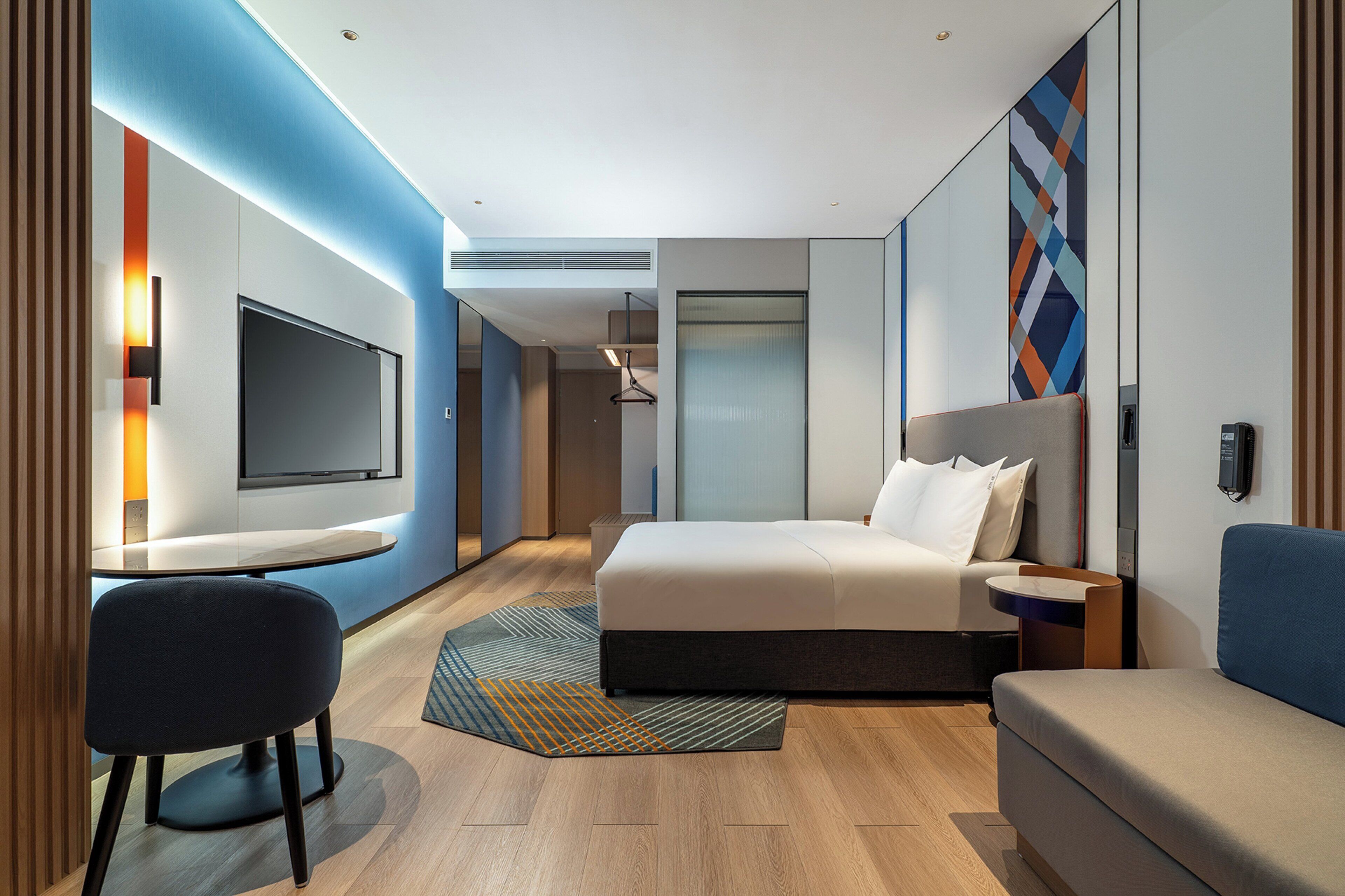 Premium bedding, down comforters, desk, laptop workspace