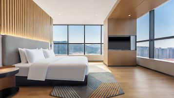 Premium bedding, down duvets, desk, laptop workspace