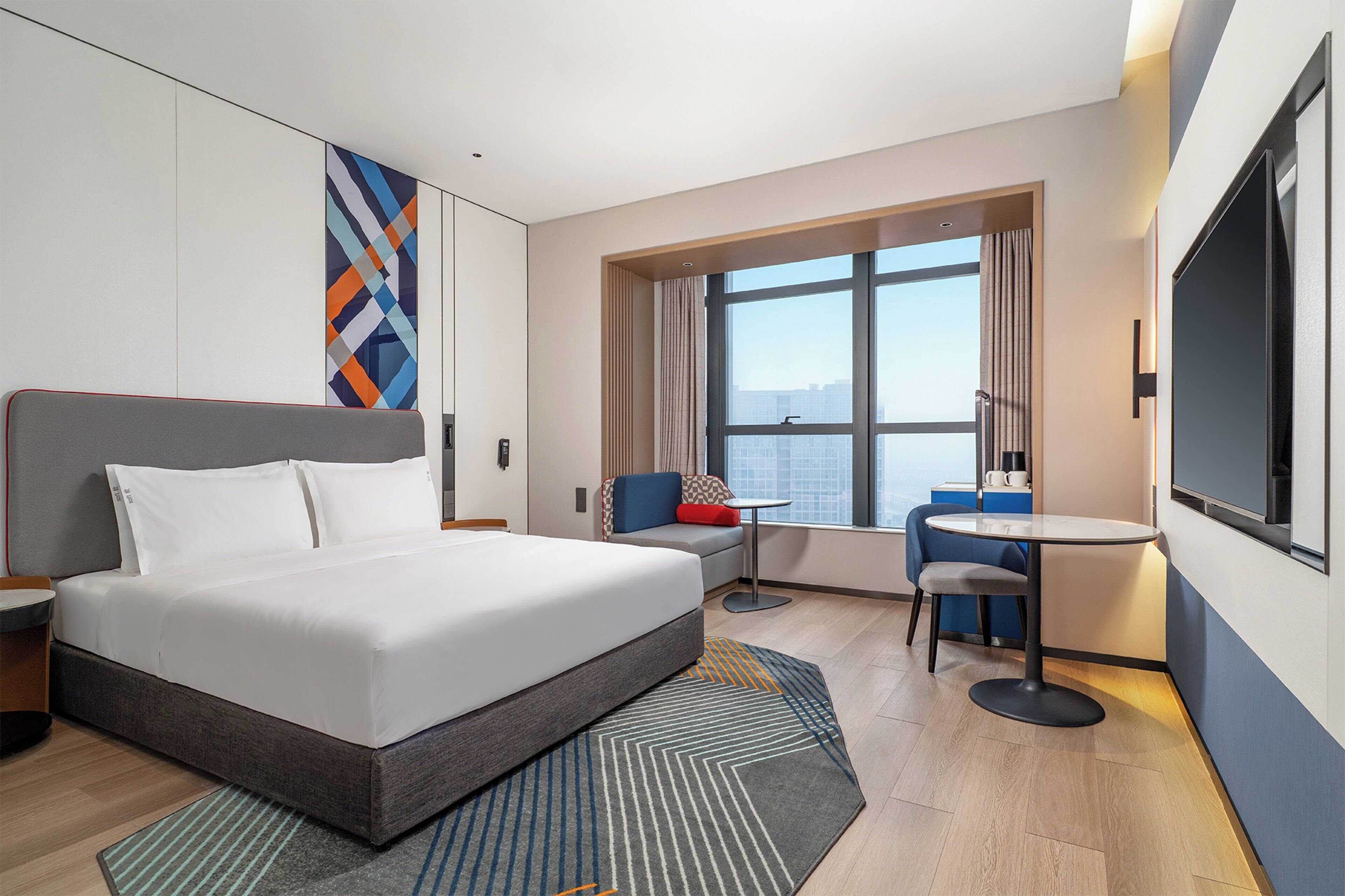 Premium bedding, down comforters, desk, laptop workspace