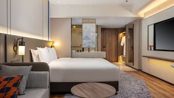 1 King Standard Extra Floor Space | Down duvets, desk, laptop workspace, blackout curtains