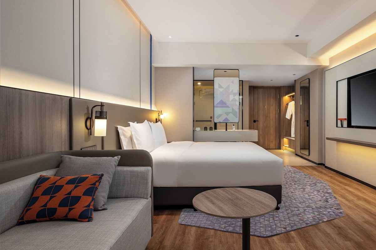 1 King Standard Extra Floor Space | Down comforters, desk, laptop workspace, blackout drapes