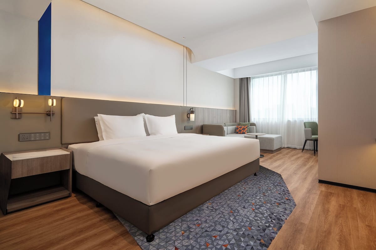 Sviitti, 1 makuuhuone | Untuvapeitot, työpöytä, kannettavalle tietokoneelle sopiva työtila