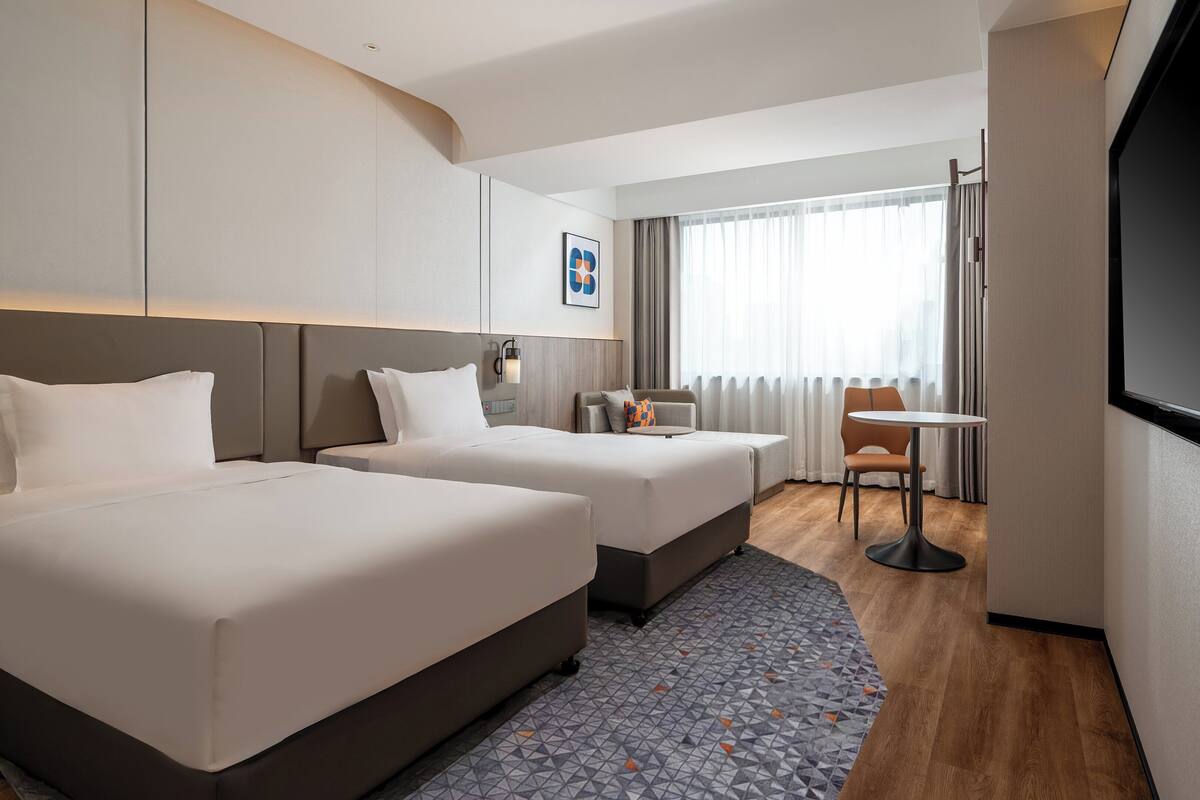 Standard-huone, 2 parisänkyä | Untuvapeitot, työpöytä, kannettavalle tietokoneelle sopiva työtila