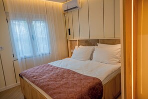 Apartamento família, sacada, vista para a cidade | Cortinas blackout, Wi-Fi de cortesia