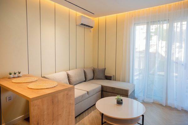 Appartamento familiare, balcone, vista città | Area soggiorno