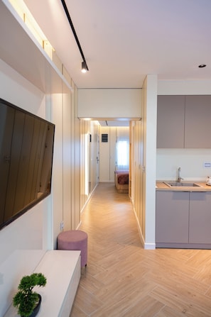 Familienapartment, Balkon, Stadtblick | Wohnbereich