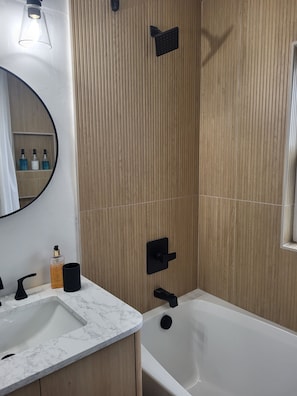 Hair dryer, towels, soap, shampoo
