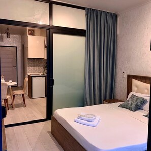 1 chambre, fer et planche à repasser, Wi-Fi, draps fournis