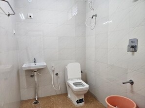 Shower, free toiletries, towels, soap