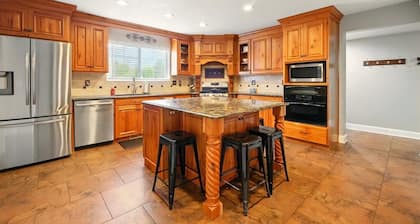 Tremendous 7-bedroom house with large movie and game room in Nibley