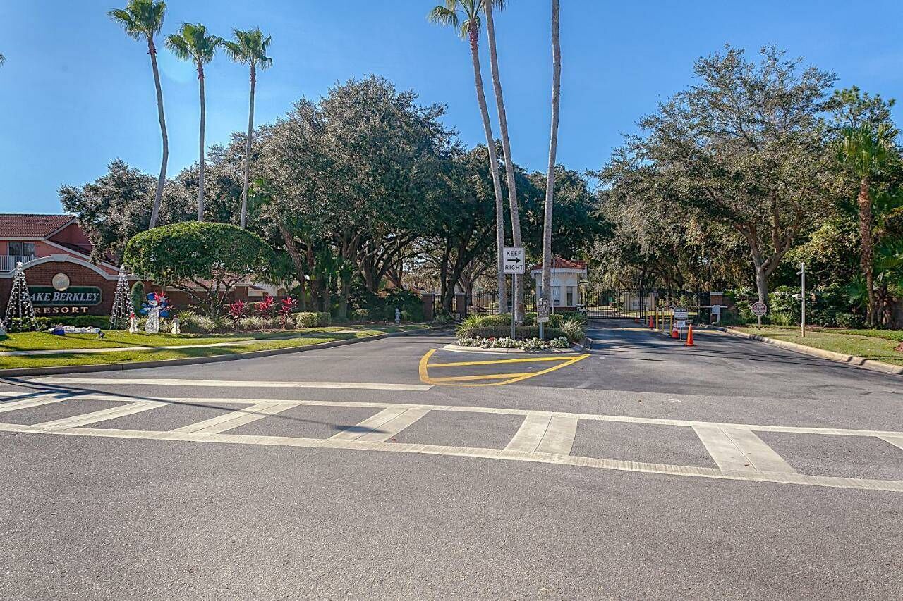A road intersection with a sign for 'Lake Berkeley Resort'.