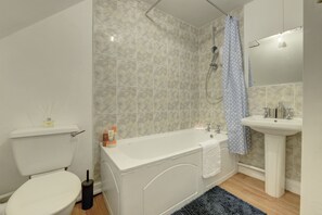 Hair dryer, towels, soap, toilet paper