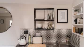 Fridge, microwave, toaster, cookware/dishes/utensils