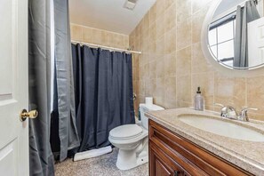 Hair dryer, soap, shampoo, toilet paper