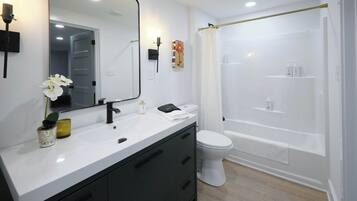 Hair dryer, towels, soap, shampoo