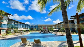 7 outdoor pools, open 9:00 AM to 7:00 PM, pool loungers