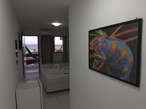 Habitación triple superior, vista parcial al mar | Wifi gratis 