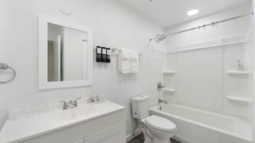 Hair dryer, towels, soap, toilet paper
