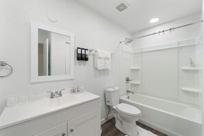 Hair dryer, towels, soap, toilet paper