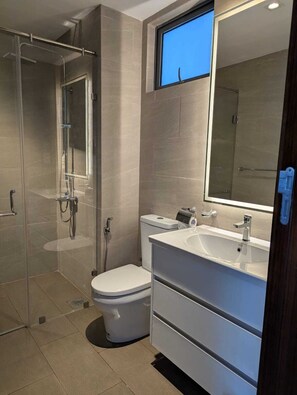 Shower, hair dryer, towels, soap