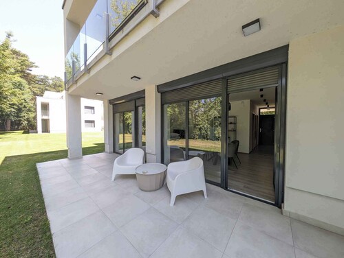 Holiday apartment newly built with WLAN, air conditioning, terrace and direct access to the garden