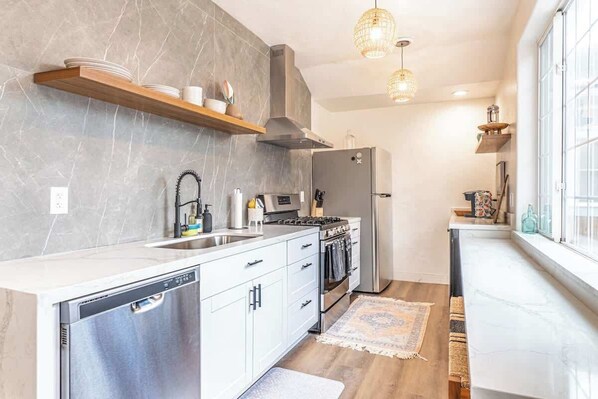 House, Multiple Beds, Patio, Garden View (Stylish 2-Bdr walking distance to Dwt) | Private kitchen | Fridge, microwave, oven, stovetop