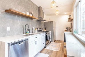 House, Multiple Beds, Patio, Garden View (Stylish 2-Bdr walking distance to Dwt) | Private kitchen | Fridge, microwave, oven, stovetop