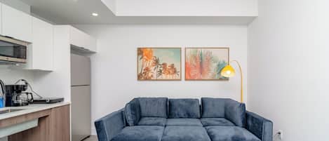 Singola Deluxe, vista città | Area soggiorno