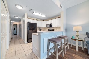 Fridge, microwave, oven, stovetop - The Dunes at Fort Morgan | Indoor/Outdoor Pool | Beach Access | Beach Getaways (Gulf Shores)