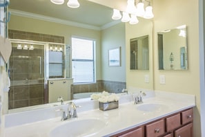 Shower, towels, soap, toilet paper