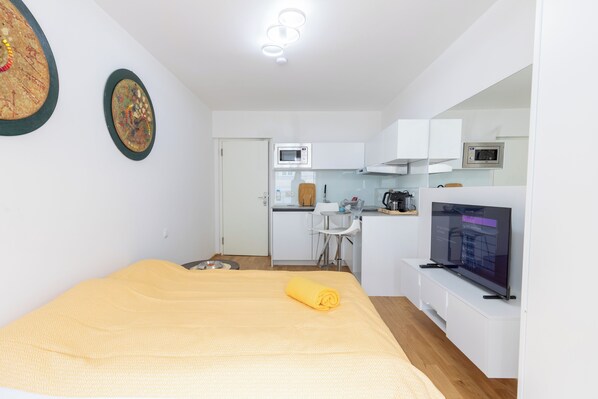 1 habitación, tabla de planchar con plancha, wifi y ropa de cama 