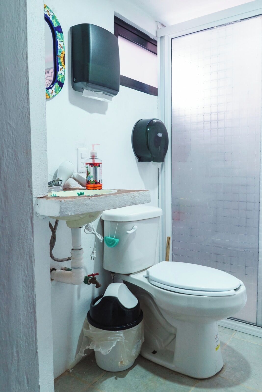 Hair dryer, towels, soap, toilet paper