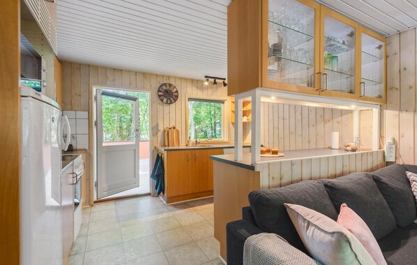 Fridge, stovetop, dishwasher, coffee/tea maker