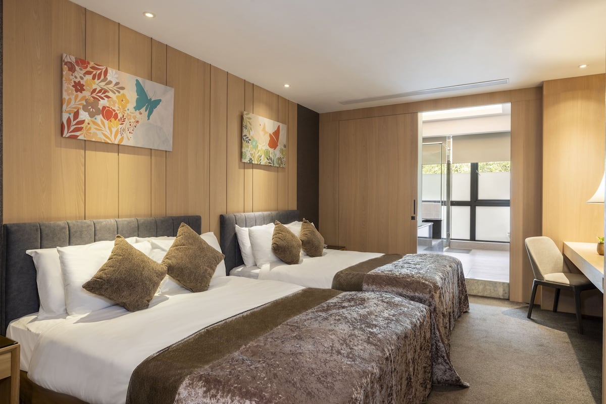 Hall Family Quad | Down comforters, free minibar, in-room safe, desk