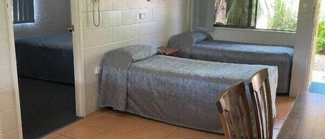 Family Room, Patio, Garden View | Iron/ironing board, free WiFi, wheelchair access