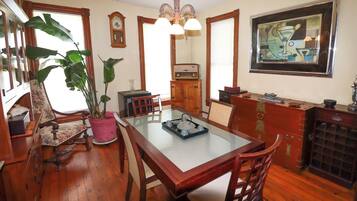 Full dining room setup, complete with everything a chef would need — dishes, serving platters, and napkins all ready to go.