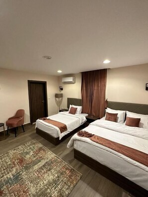 Deluxe Triple Room | In-room safe, laptop workspace, soundproofing, iron/ironing board -  Aziz Egypt Pyramids View (Giza)