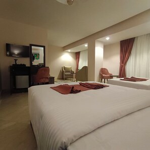 Deluxe Twin Room, City View | In-room safe, laptop workspace, soundproofing, iron/ironing board