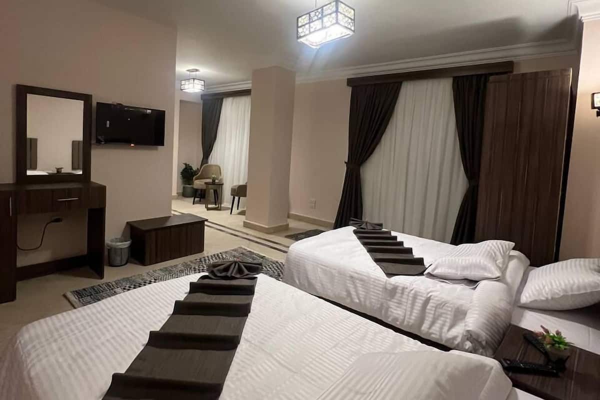 Deluxe Twin Room, City View | In-room safe, laptop workspace, soundproofing, iron/ironing board
